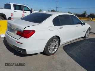 2014 BMW 7 Series ALPINA B7 with VIN WBAYE8C51ED135267, listed as a IAAI auction lot 42592569 with 138,110 mi miles and . Bid and sale history available at DreamBid. Image 4.
