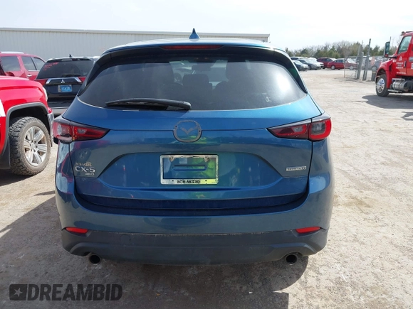 2023 Mazda CX-5 2.5 S Select Package with VIN JM3KFBBM9P0112736, listed as a IAAI auction lot 41817695 with 72,719 mi miles. Bid and sale history available at carsss.com. Image 17.