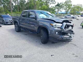 2021 Toyota Tacoma SR z VIN 5TFCZ5AN8MX277650, wystawiony jako IAAI lot #41911471 z przebiegiem 45 278 mil mil oraz . Historia ofert i sprzedaży dostępna na DreamBid. Obrazek 1.