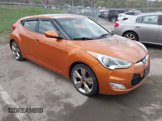 2013 Hyundai Veloster RE:MIX with VIN KMHTC6AD5DU106088, listed as a IAAI auction lot 41904678 with 213,478 mi miles and . Bid and sale history available at DreamBid. Image 1.
