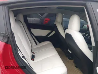 2018 Tesla Model 3 Long Range Battery z VIN 5YJ3E1EB7JF135199, wystawiony jako IAAI lot #41580853 z przebiegiem 131 774 mil mil oraz . Historia ofert i sprzedaży dostępna na DreamBid. Obrazek 8.