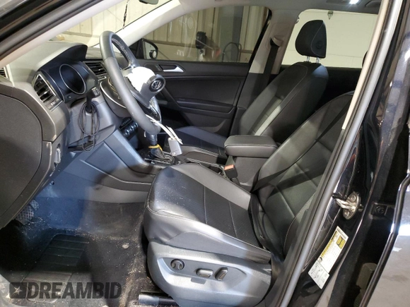 2021 Volkswagen Tiguan SE with VIN 3VV2B7AXXMM071024, listed as a Copart auction lot 52243675 with 31,448 mi miles and Salvage Title. Bid and sale history available at DreamBid. Image 7.