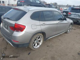 2014 BMW X1 sDrive28i with VIN WBAVM1C52EVW48857, listed as a IAAI auction lot 41179830 with 113,315 mi miles. Bid and sale history available at carsss.com. Image 4.