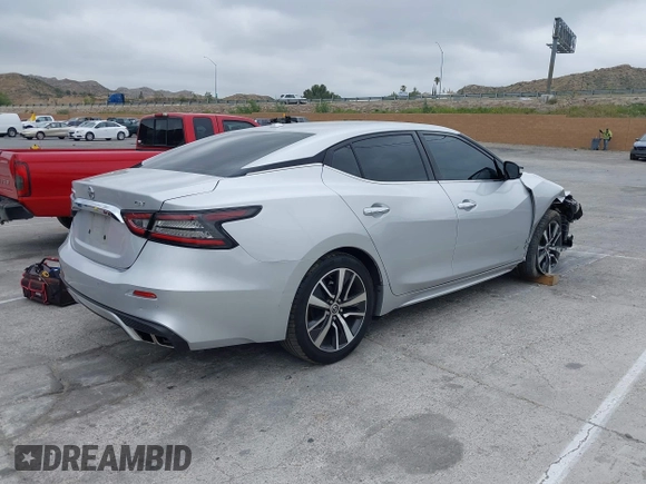 2020 Nissan Maxima SV with VIN 1N4AA6CVXLC380646, listed as a IAAI auction lot 42041422 with 99,579 mi miles and . Bid and sale history available at DreamBid. Image 4.