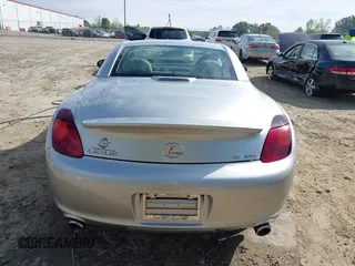 2004 Lexus SC with VIN JTHFN48YX40059526, listed as a IAAI auction lot 41973307 with 123,466 mi miles. Bid and sale history available at carsss.com. Image 16.