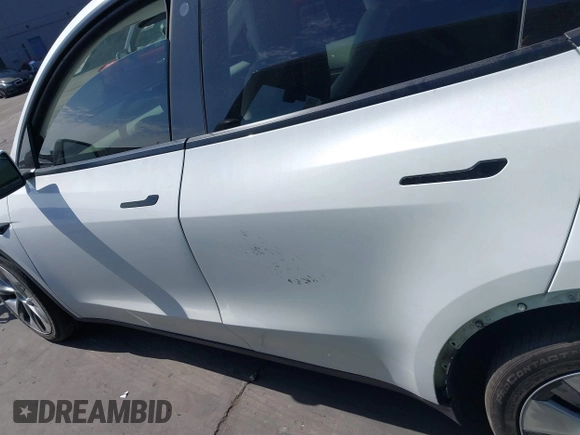 2021 Tesla Model Y Long Range with VIN 5YJYGDEE3MF081304, listed as a IAAI auction lot 41706240 with 90,510 mi miles and . Bid and sale history available at DreamBid. Image 14.