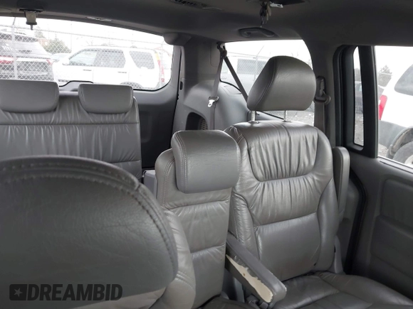 2010 Honda Odyssey Touring with VIN 5FNRL3H95AB040354, listed as a IAAI auction lot 41889501 with 155,069 mi miles. Bid and sale history available at carsss.com. Image 8.