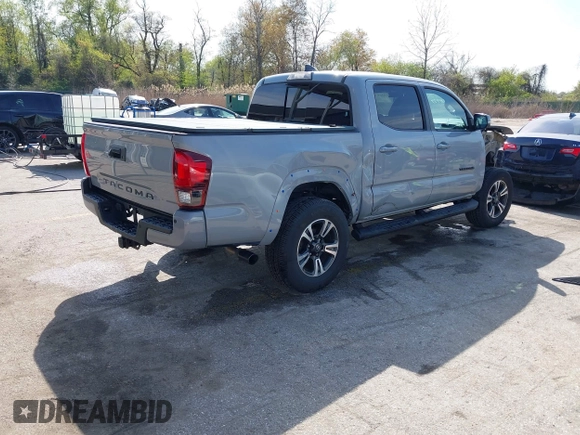 2018 Toyota Tacoma SR with VIN 3TMCZ5AN6JM170128, listed as a IAAI auction lot 42038979 with 59,497 mi miles. Bid and sale history available at carsss.com. Image 4.
