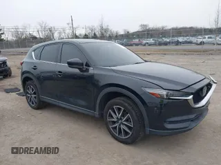 2017 Mazda CX-5 Grand Touring with VIN JM3KFBDL6H0179557, listed as a IAAI auction lot 41546493 with 103,585 mi miles. Bid and sale history available at carsss.com. Image 1.