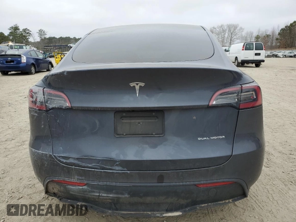 2022 Tesla Model Y Long Range with VIN 7SAYGAEE6NF523835, listed as a Copart auction lot 47874565 with Not Provided miles and Salvage Title. Bid and sale history available at DreamBid. Image 6.