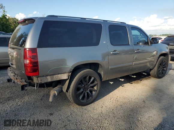 2007 Chevrolet Suburban LS with VIN 1GNFC16097J403193, listed as a Copart auction lot 51236075 with 191,350 mi miles and Salvage title. Bid and sale history available at DreamBid. Image 3.