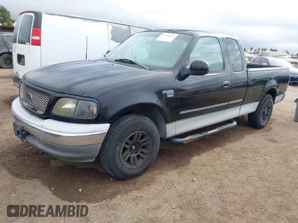 2002 Ford F-150 XL with VIN 1FTRX17W92NC06992, listed as a IAAI auction lot 41194470 with 253,923 mi miles. Bid and sale history available at carsss.com. Image 2.