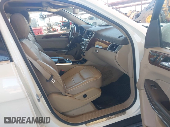 2014 Mercedes-Benz GL 450 with VIN 4JGDF7CE3EA336481, listed as a IAAI auction lot 42025576 with 145,244 mi miles and . Bid and sale history available at DreamBid. Image 5.