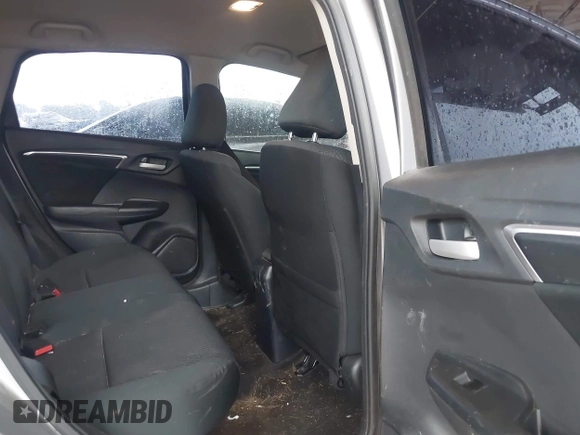 2018 Honda Fit LX with VIN 3HGGK5H4XJM735209, listed as a IAAI auction lot 42348191 with 161,902 mi miles and . Bid and sale history available at DreamBid. Image 8.