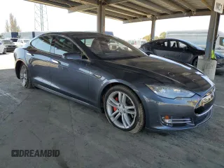 2014 Tesla Model S 60 with VIN 5YJSA1H17EFP63229, listed as a Copart auction lot 51776195 with 156,356 mi miles and Salvage Title. Bid and sale history available at DreamBid. Image 4.
