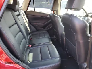 2014 Mazda CX-5 Grand Touring with VIN JM3KE4DY8E0421660, listed as a Copart auction lot 48588525 with 144,939 mi miles and Salvage Title. Bid and sale history available at DreamBid. Image 11.