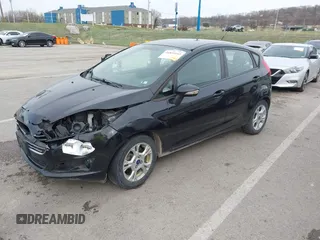 2015 Ford Fiesta SE z VIN 3FADP4EJ3FM115466, wystawiony jako IAAI lot #41849165 z przebiegiem 178 002 mil mil oraz . Historia ofert i sprzedaży dostępna na DreamBid. Obrazek 17.