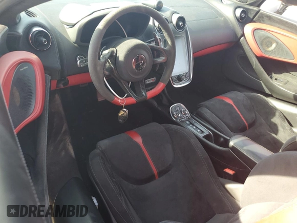 2016 McLaren 570S z VIN SBM13DAA3GW001071, wystawiony jako Copart lot #43108715 z przebiegiem Nie podano mil oraz Szkody całkowita. Historia ofert i sprzedaży dostępna na DreamBid. Obrazek 8.