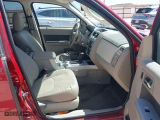 2011 Mercury Mariner Premier with VIN 4M2CN8HG3BKJ08774, listed as a IAAI auction lot 42007038 with 127,551 mi miles. Bid and sale history available at carsss.com. Image 5.