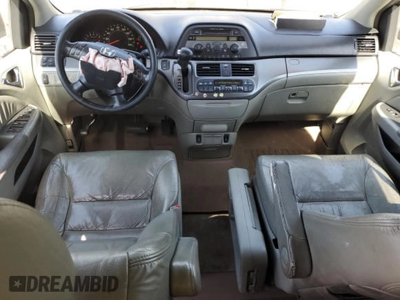 2007 Honda Odyssey EX-L z VIN 5FNRL38677B424117, wystawiony jako Copart lot #58814235 z przebiegiem 188 908 mil mil oraz Szkoda całkowita • Salvage title. Historia ofert i sprzedaży dostępna na DreamBid. Obrazek 8.