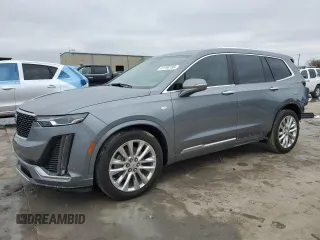 2020 Cadillac XT6 FWD Premium Luxury with VIN 1GYKPCRS4LZ222044, listed as a Copart auction lot 43768185 with 105,640 mi miles and Salvage Title. Bid and sale history available at carsss.com. Image 1.