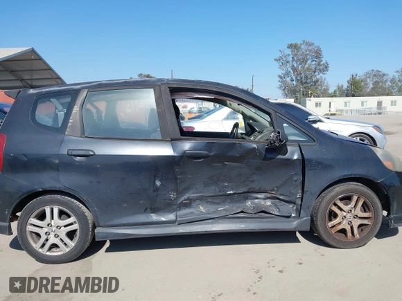 2007 Honda Fit Sport with VIN JHMGD37637S005754, listed as a IAAI auction lot 42663714 with 239,000 mi miles and . Bid and sale history available at DreamBid. Image 6.