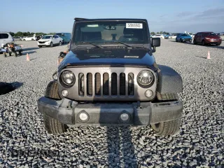 2018 Jeep Wrangler Willys Wheeler W z VIN 1C4AJWAGXJL852498, wystawiony jako Copart lot #52866945 z przebiegiem 90 515 mil mil oraz Szkoda całkowita • Salvage title. Historia ofert i sprzedaży dostępna na DreamBid. Obrazek 5.