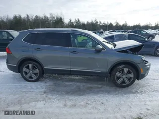2020 Volkswagen Tiguan SE with VIN 3VV2B7AXXLM093989, listed as a IAAI auction lot 41599430 with 28,801 mi miles. Bid and sale history available at carsss.com. Image 14.