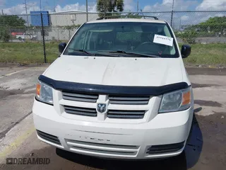 2010 Dodge Grand Caravan SE with VIN 2D4RN4DE5AR490306, listed as a IAAI auction lot 41944376 with 127,107 mi miles. Bid and sale history available at carsss.com. Image 6.
