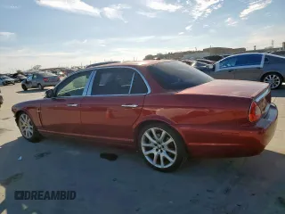 2008 Jaguar XJ with VIN SAJWA79B58SH20211, listed as a Copart auction lot 46951055 with 144,655 mi miles and Salvage Title. Bid and sale history available at carsss.com. Image 2.
