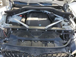 2020 BMW X6 xDrive40i z VIN 5UXCY6C00L9D45082, wystawiony jako Copart lot #52588665 z przebiegiem 40 810 mil mil oraz Szkoda całkowita • Salvage title. Historia ofert i sprzedaży dostępna na DreamBid. Obrazek 12.