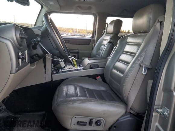 2003 Hummer H2 with VIN 5GRGN23U33H124696, listed as a Copart auction lot 79452004 with 154,144 mi miles and Salvage Title. Bid and sale history available at carsss.com. Image 7.