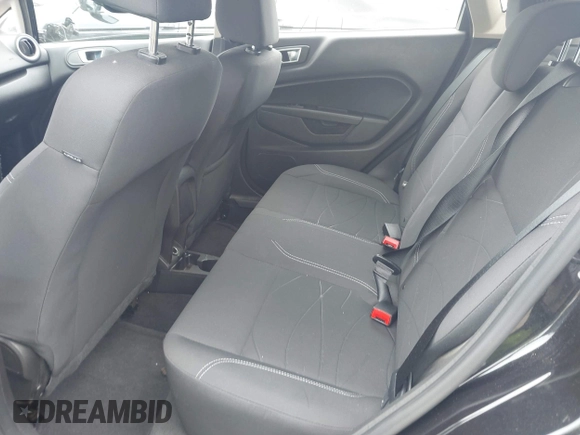 2014 Ford Fiesta SE z VIN 3FADP4EJ3EM205098, wystawiony jako IAAI lot #42371316 z przebiegiem 130 420 mil mil oraz . Historia ofert i sprzedaży dostępna na DreamBid. Obrazek 8.