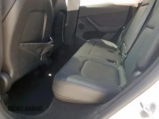 2023 Tesla Model Y Long Range z VIN 7SAYGDEE1PA155629, wystawiony jako Copart lot #52234735 z przebiegiem 24 944 mil mil oraz Szkoda całkowita • Salvage title. Historia ofert i sprzedaży dostępna na DreamBid. Obrazek 12.