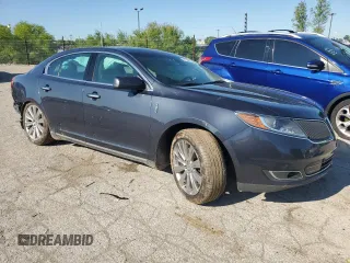 2014 Lincoln MKS EcoBoost z VIN 1LNHL9FT8EG607807, wystawiony jako Copart lot #57755915 z przebiegiem 203 316 mil mil oraz Szkoda całkowita • Salvage title. Historia ofert i sprzedaży dostępna na DreamBid. Obrazek 4.