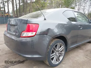 2012 Scion tC with VIN JTKJF5C7XC3031406, listed as a IAAI auction lot 41947478 with 150,762 mi miles. Bid and sale history available at carsss.com. Image 6.