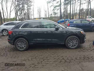 2021 Audi Q3 Premium with VIN WA1AUCF34M1148531, listed as a IAAI auction lot 41815286 with 31,934 mi miles and . Bid and sale history available at DreamBid. Image 13.