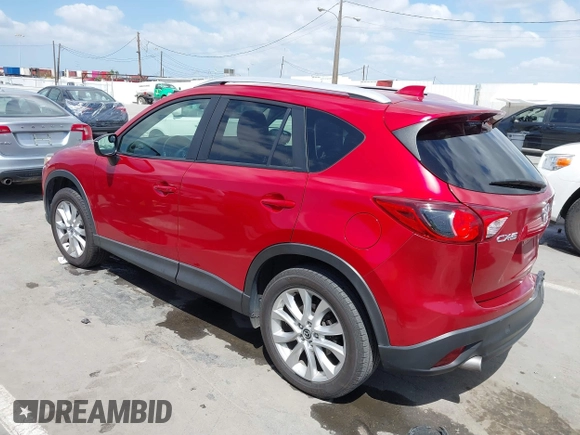 2015 Mazda CX-5 Grand Touring with VIN JM3KE2DY7F0537017, listed as a IAAI auction lot 41953011 with 78,098 mi miles. Bid and sale history available at carsss.com. Image 3.