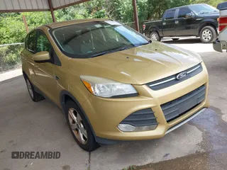 2014 Ford Escape SE z VIN 1FMCU9GX2EUC04173, wystawiony jako IAAI lot #42745018 z przebiegiem Nie podano mil oraz . Historia ofert i sprzedaży dostępna na DreamBid. Obrazek 1.