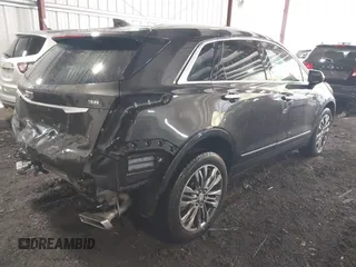 2019 Cadillac XT5 Luxury FWD with VIN 1GYKNCRS6KZ123035, listed as a IAAI auction lot 41588690 with 82,365 mi miles and . Bid and sale history available at DreamBid. Image 4.