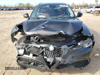 2019 Alfa Romeo Stelvio z VIN ZASPAJAN0K7C36435, wystawiony jako Copart lot #88057385 z przebiegiem Nie podano mil oraz Szkoda całkowita • Salvage title. Historia ofert i sprzedaży dostępna na DreamBid. Obrazek 5.