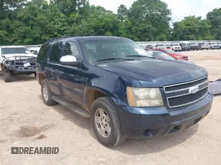 2007 Chevrolet Tahoe LS z VIN 1GNFC13CX7R264532, wystawiony jako IAAI lot #42425650 z przebiegiem 254 286 mil mil oraz . Historia ofert i sprzedaży dostępna na DreamBid. Obrazek 1.