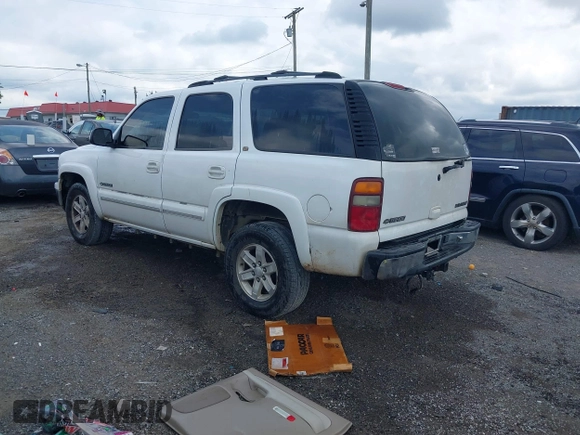 2002 Chevrolet Tahoe LS with VIN 1GNEK13Z22R143490, listed as a IAAI auction lot 42609711 with 323,388 mi miles and . Bid and sale history available at DreamBid. Image 3.