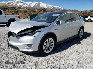2016 Tesla Model X 70D with VIN 5YJXCAE29GF004033, listed as a Copart auction lot 49673975 with 220,259 mi miles and Salvage Title. Bid and sale history available at DreamBid. Image 1.