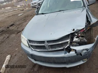 2009 Dodge Avenger SXT with VIN 1B3LC56B09N522736, listed as a IAAI auction lot 41195477 with 100,977 mi miles and . Bid and sale history available at DreamBid. Image 12.