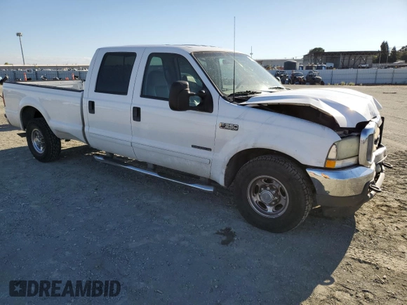 2003 Ford F-350 XL with VIN 1FTSW30F63EB07672, listed as a Copart auction lot 76659184 with 243,580 mi miles and Salvage Title. Bid and sale history available at DreamBid. Image 4.
