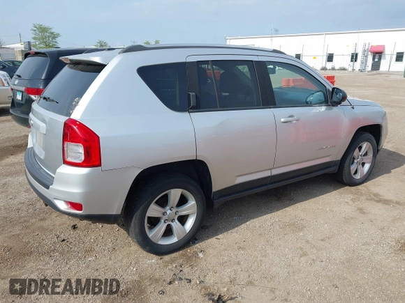 2013 Jeep Compass Sport with VIN 1C4NJDBB4DD119077, listed as a IAAI auction lot 42142532 with 131,679 mi miles. Bid and sale history available at carsss.com. Image 4.