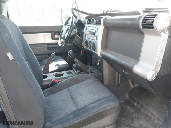 2010 Toyota FJ Cruiser with VIN JTEBU4BF6AK074479, listed as a IAAI auction lot 41843444 with 161,245 mi miles. Bid and sale history available at carsss.com. Image 5.