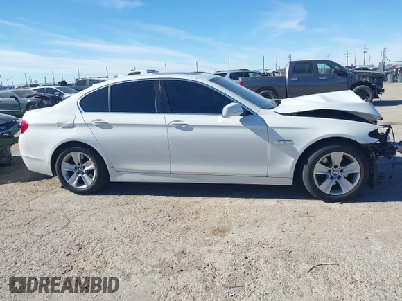 2013 BMW 5 Series 528i with VIN WBAXG5C59DDY32432, listed as a IAAI auction lot 41230673 with 103,069 mi miles and . Bid and sale history available at carsss.com. Image 14.
