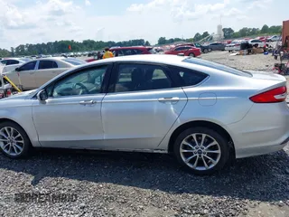 2017 Ford Fusion SE with VIN 3FA6P0H77HR164757, listed as a IAAI auction lot 42604366 with 182,532 mi miles and . Bid and sale history available at DreamBid. Image 14.